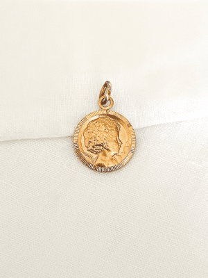 petite médaille ancienne d'un ange en or laminé fix