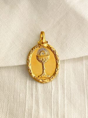 médaille ancienne en or de première communion
