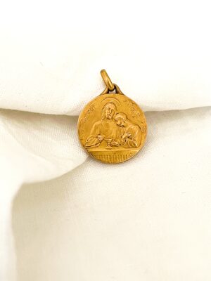 Médaille ancienne de première communion en plaqué or laminé fix